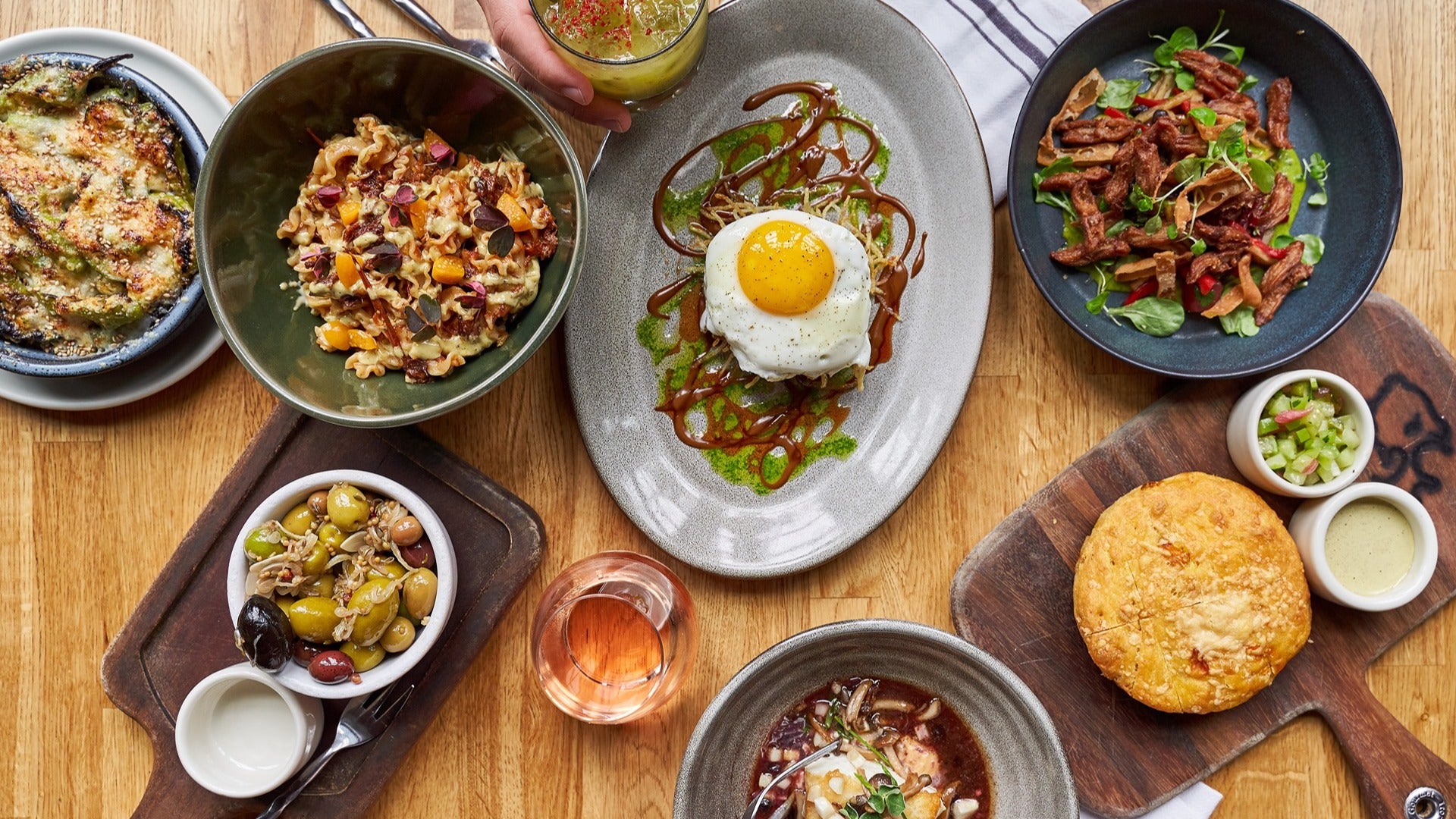 food spread of salads, soups, drinks and more